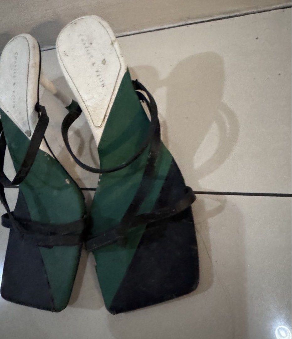 Charles & Keith Green Black Block Heel Sandals (Category: Heels) located in Manila. Submitted by decluterthings888 (Listing ID 1464030736, Image 2). Description: - Stylish Charles & Keith sandals - Eye-catching green and black color block design - Delicate thin black straps - Trendy block heel with a green cap.