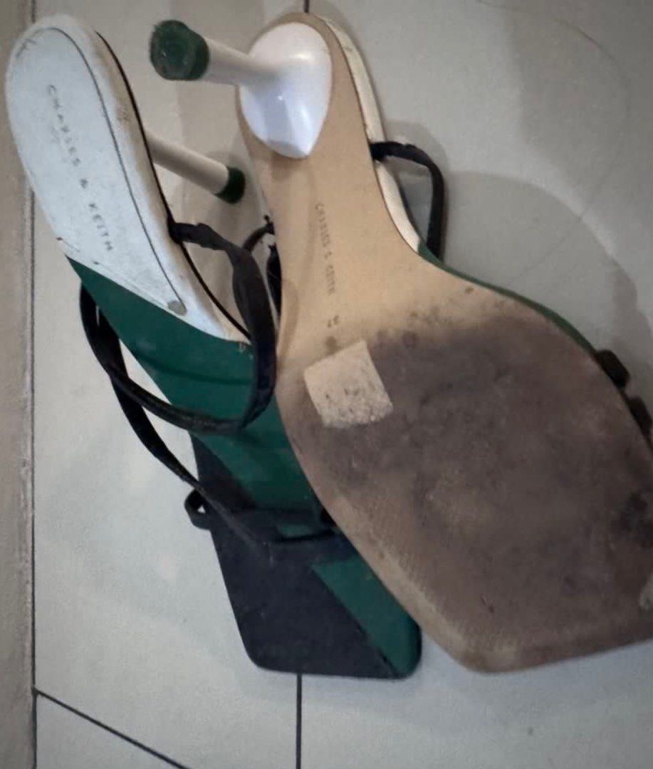 Charles & Keith Green Black Block Heel Sandals (Category: Heels) located in Manila. Submitted by decluterthings888 (Listing ID 1464030736, Image 1). Description: - Stylish Charles & Keith sandals - Eye-catching green and black color block design - Delicate thin black straps - Trendy block heel with a green cap.