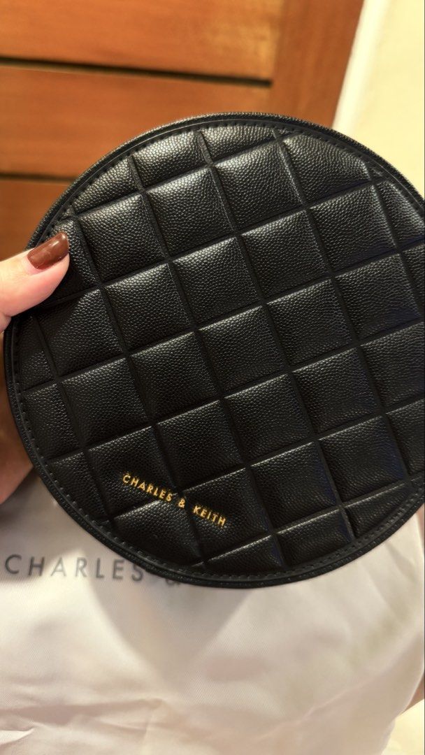 Charles & Keith Quilted Round Bag (Category: Cross-body Bags) located in San Fernando. Submitted by patmalonzo (Listing ID 1463995895, Image 3). Description: Original Charles & Keith not mall pull-out (as they say) Used once only. No flaws. Good as new! Gold chain have no tarnishings.