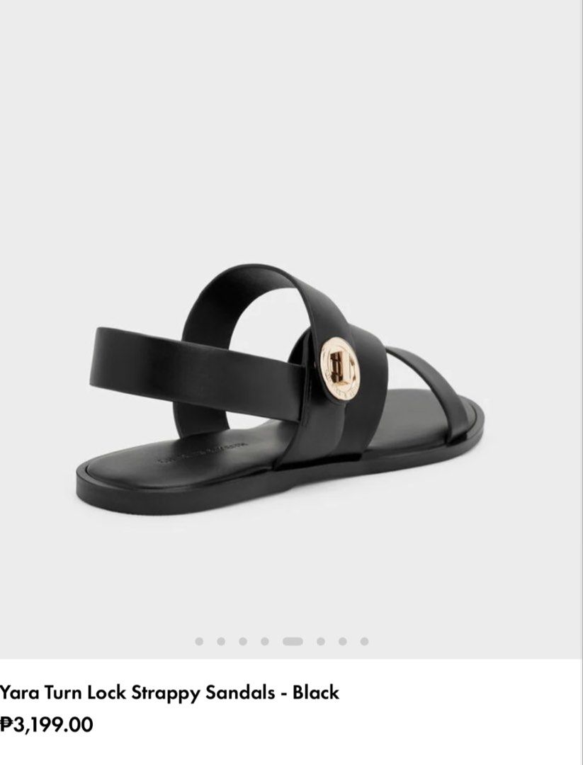 Charles & Keith Sandals (Category: Flats & Sandals) located in Cabanatuan. Submitted by scrlttt (Listing ID 1464076060, Image 3). Description: - Brand: Charles & Keith - Color: Black - Style: Strappy sandals - Features: Turn lock detail on side strap, comfortable flat sole - Design: Easy slip-on - Versatility: Great for casual outings or dressing up - Original Price: P3,199.00.