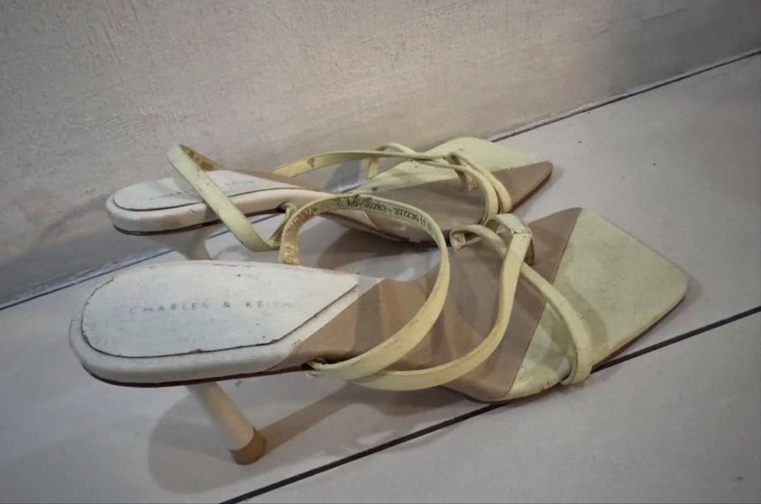 Charles & Keith Two-Tone Square Toe Heeled Sandals (Category: Heels) located in Manila. Submitted by decluterthings888 (Listing ID 1464030950, Image 3). Description: - Brand: Charles & Keith - Style: Heeled Sandals - Design: Two-tone, Square toe, Thin straps - Heel Height: Moderate - Condition: Shows some signs of wear on soles and insoles, but plenty of life left. - Versatility: Perfect for dressing up or down..