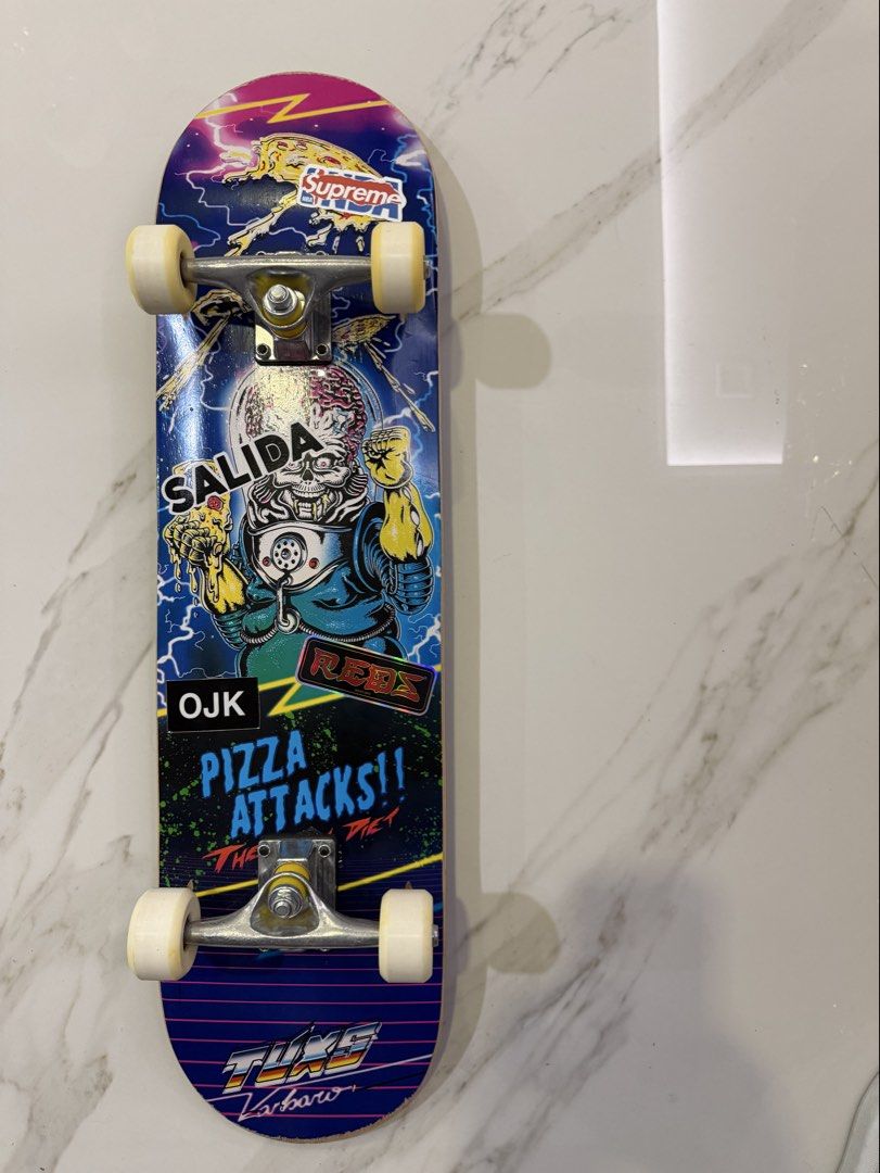 CHASER SKATEBOARD with Custom Stickers (Category: Skates, Rollerblades & Scooters) located in Makati City. Submitted by monkeykingo (Listing ID 1463941950, Image 2). Description: - CHASER SKATEBOARD - Includes custom stickers (Supreme, OJK, and more) - Features a cool pizza attack bottom graphic - Comes with attached trucks and wheels - Ready to ride and perfect for practicing tricks.