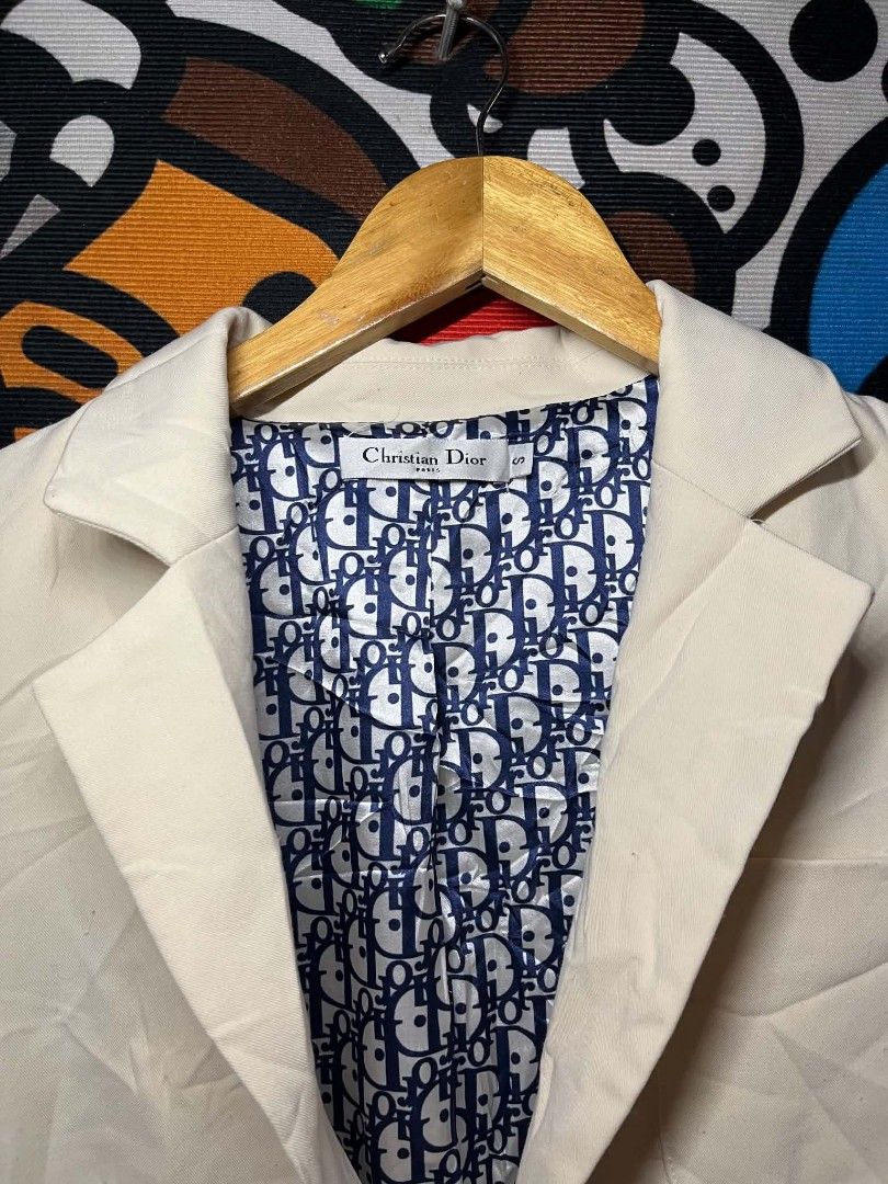 Christian Dior (Category: Coats, Jackets and Outerwear) located in Taguig. Submitted by bimbyanche19839 (Listing ID 1464022926, Image 2). Description: Christian Dior Coat Size Medium Width 19 Length 26 Color rate 9.5/10 Good Condition Complete tags Issue: Washable Stain, Need wash only. 🏷️ 700php plus ship.