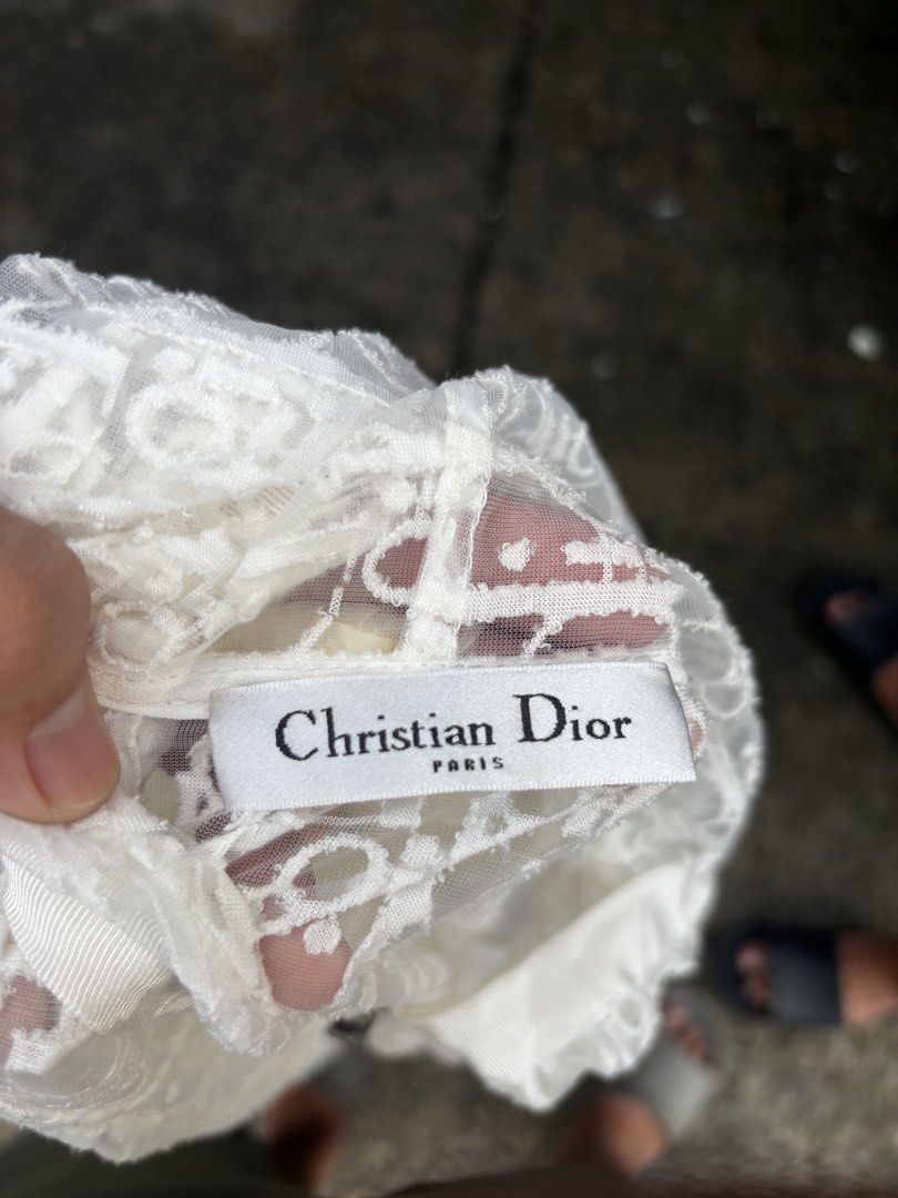 Christian Dior White Monogram Transparent mesh jacket (Category: Coats, Jackets and Outerwear) located in Caloocan City. Submitted by neweagle-424b (Listing ID 1464065390, Image 2). Description: large to xl Dimes : ( W 23 x 24.5 L ) ❌ hole sa hood last pic issue - All-over Dior monogram pattern - Zip-up front - Hooded design - Lightweight and sheer material - Ideal for layering or as a statement piece - Condition: Great novaliches qc metro manila
