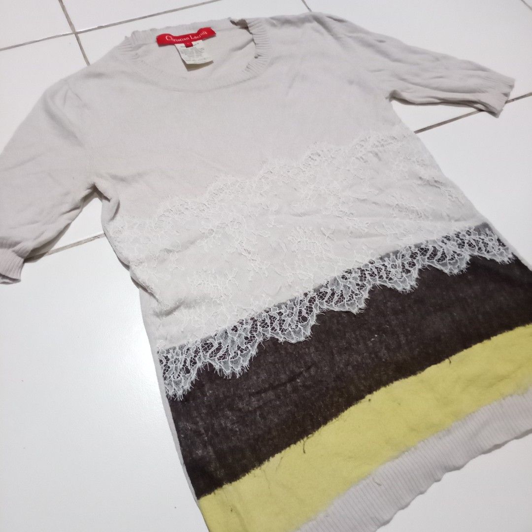 Christian Lacroix Knit Lace Top (Category: Others Tops) located in Dasmarinas. Submitted by evitajana09 (Listing ID 1464062844, Image 3). Description: Christian Lacroix lace top ● Color: Grey with brown and yellow ● Size: Small ● Condition: has minimal holes on the lace, minimal lints, but already washed and steamed ● Price: ₱178 (+sf) MOP: Gotyme, Gcash MOD: J&T or Lalamove if near Dasma, Cavite.