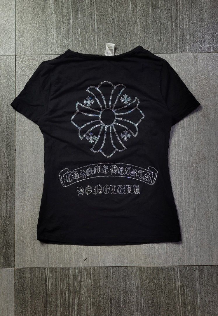 CHROME HEARTS HONOLULU RHINESTONE TEE (FAKE) (Category: Tshirts & Polo Shirts ) located in Manila. Submitted by 7100treasure.co (Listing ID 1463972990, Image 2). Description: CHROME HEARTS HONOLULU RHINESTONE TEE ​• Brand: Chrome Hearts • Style: Rhinestone / Strass Graphic Tee • Color: Black • Size on Tag: Medium ("MIDDLE" / Women's Fit) • Made in USA • Rhinestone Plus Cross / Floral motif on front chest • Large Rhinestone Plus Cross / Floral mot