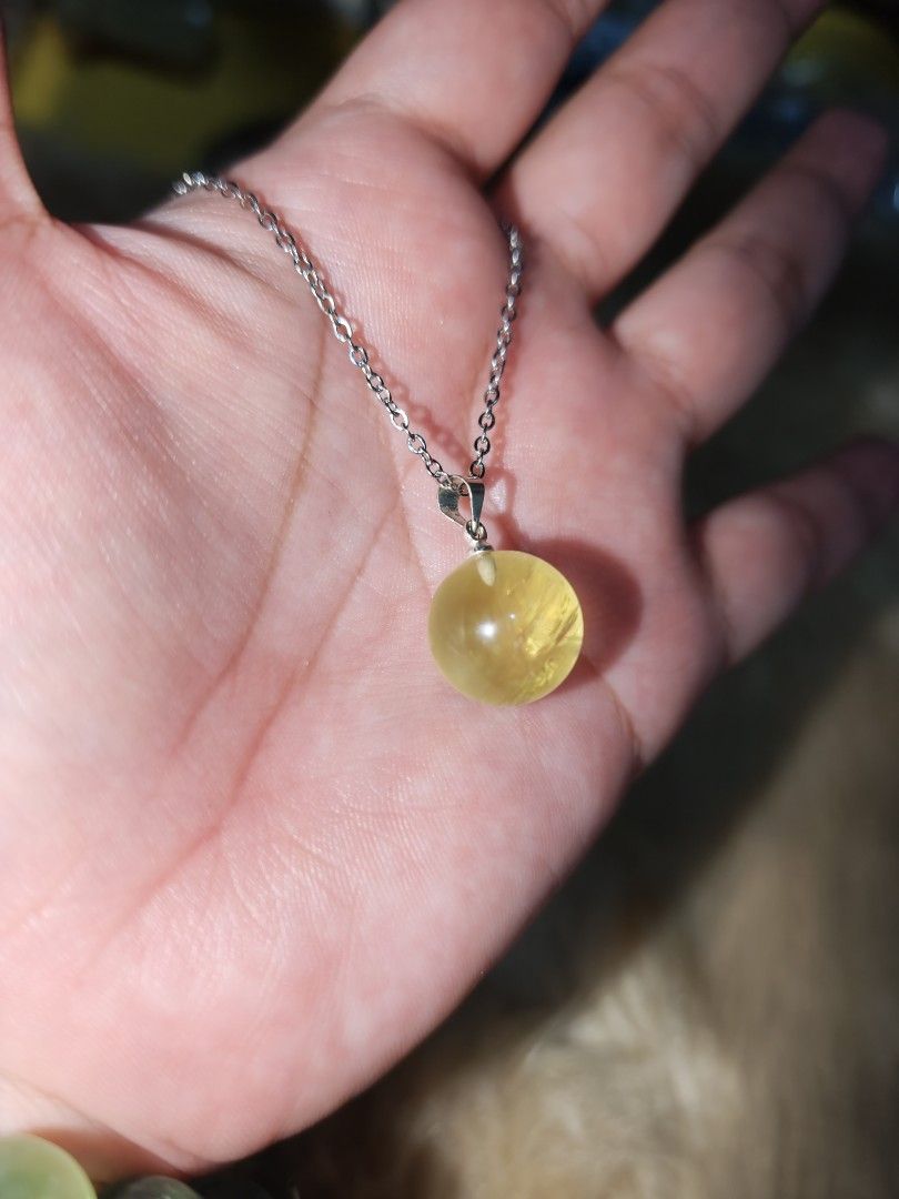 Citrine Ball Pendant 1pc only (Category: Necklaces) located in Quezon City. Submitted by piaoliangcollections.ph (Listing ID 1463953052, Image 2). Description: Made from Natural Citrine Crystal. only one piece available, get it now. Citrine is a vibrant yellow quartz crystal widely known as the "Merchant's Stone" for its powerful ties to wealth, prosperity, and positive energy. Wealth and Abundance Attracts Prosperity: Citrine is believed to draw