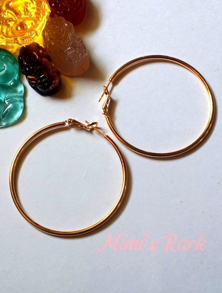 Classic Gold Hoop Earrings (Category: Earrings) located in Taguig. Submitted by mimisrack (Listing ID 1463965195, Image 3). Description: 💛Timeless everyday earrings that elevate any look -Sleek round hoop design with polished gold finish -Lightweight and comfortable for all-day wear -Secure latch closure for easy use -Versatile style - perfect for casual or dressy outfits -A must-have staple for every jewelry collection 🧿 diameter: 47mm 🧿 thic