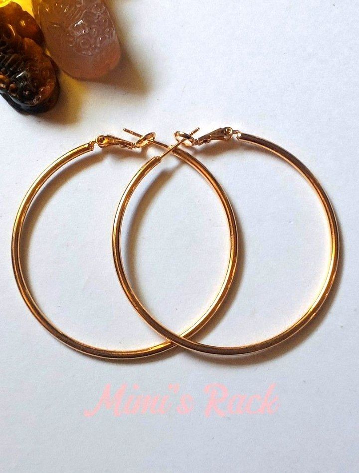 Classic Gold Hoop Earrings (Category: Earrings) located in Taguig. Submitted by mimisrack (Listing ID 1463965195, Image 2). Description: 💛Timeless everyday earrings that elevate any look -Sleek round hoop design with polished gold finish -Lightweight and comfortable for all-day wear -Secure latch closure for easy use -Versatile style - perfect for casual or dressy outfits -A must-have staple for every jewelry collection 🧿 diameter: 47mm 🧿 thic