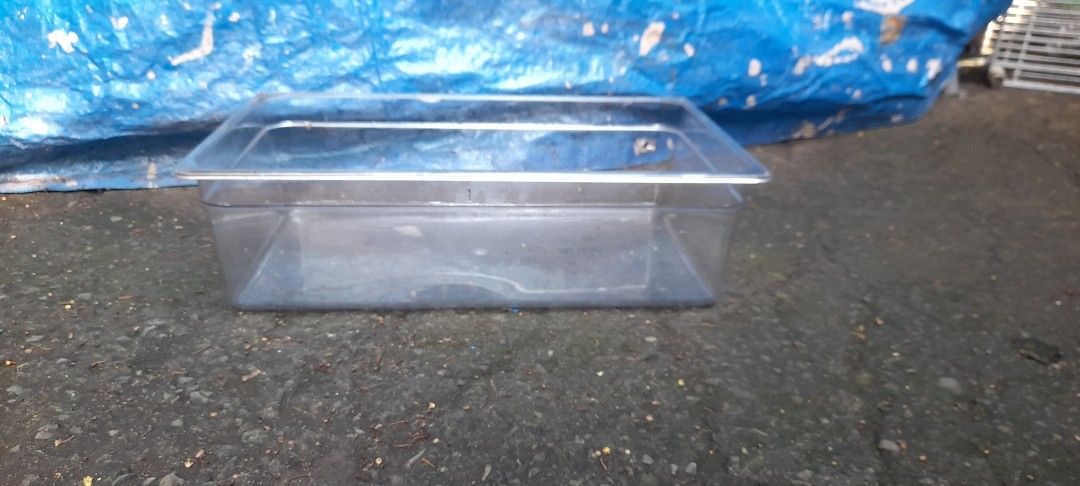 Clear Plastic Food Pan Container (Category: Food Organization & Storage) located in Valenzuela. Submitted by newbear.425b6e (Listing ID 1463947120, Image 1). Description: - Rectangular clear plastic container - Ideal for food storage or organizing - Approximate measurements: 20" L x 12" W x 6" H - Made of durable acrylic plastic - Easy to clean - Stackable design -250 each.