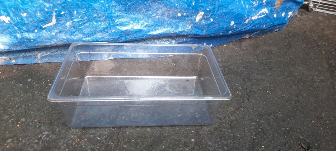Clear Plastic Food Pan Container (Category: Food Organization & Storage) located in Valenzuela. Submitted by newbear.425b6e (Listing ID 1463947120, Image 2). Description: - Rectangular clear plastic container - Ideal for food storage or organizing - Approximate measurements: 20" L x 12" W x 6" H - Made of durable acrylic plastic - Easy to clean - Stackable design -250 each.