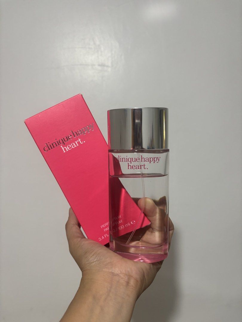 Clinique Happy Heart - not dupe (Category: Fragrance & Deodorants) located in Cebu City. Submitted by tahyeeefb78867 (Listing ID 1464034260, Image 1). Description: - not dupe. more than 2/3 left - 100ML bottle - Fragrance Notes: Cucumber, Brazilian Orange, Wisteria, Clematis, Fresh Woods, Skin Musks - Ideal for daytime wear, especially during Spring and Summer - Enjoy a long-lasting and uplifting scent.