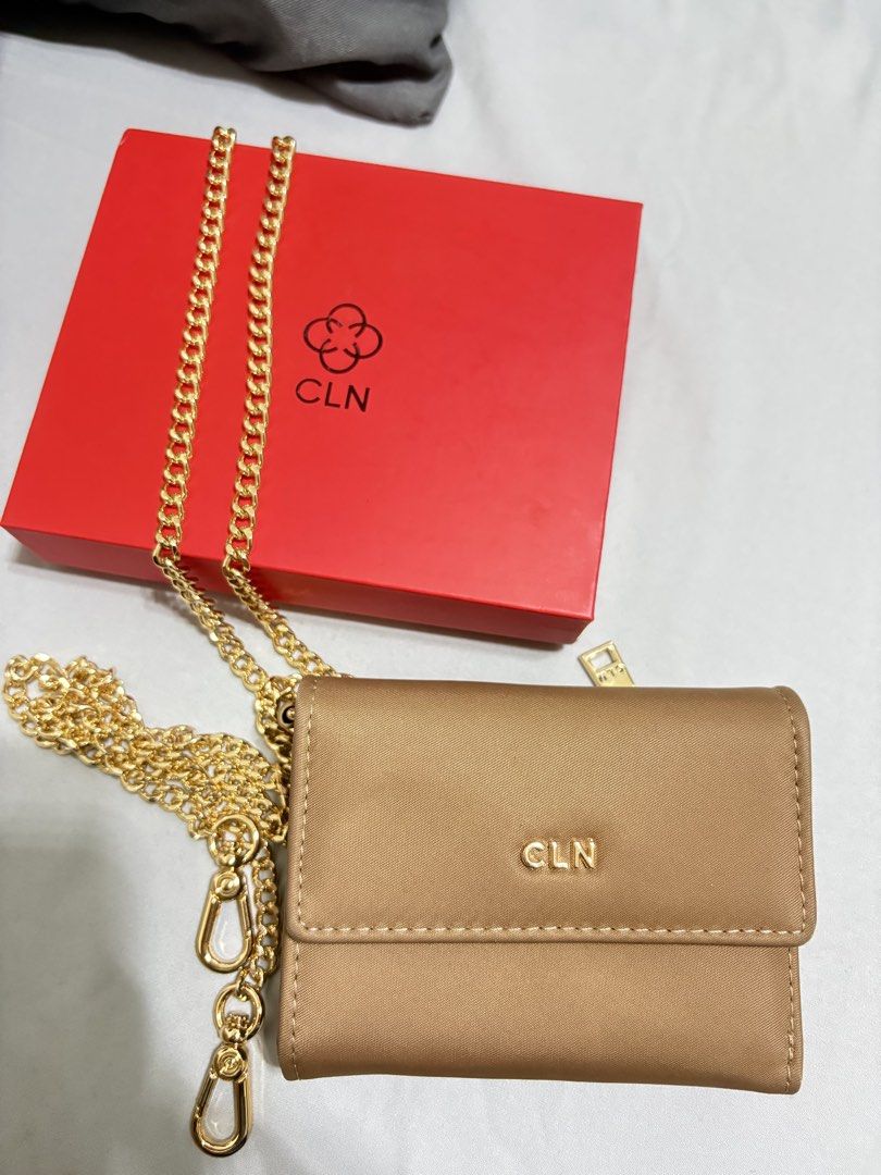 CLN Wallet - Brown (Category: Wallets & Card holders) located in Taguig. Submitted by style.spot (Listing ID 1464097682, Image 2). Description: Used only for one month. Nylon material Inclusions: sling strap, dustbag, box rfs: still prefer black wallets .