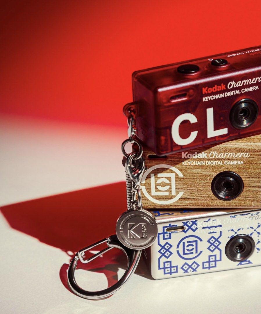 ON HAND || CLOT x KODAK CHARMERA (Category: Cameras) located in Las Pinas. Submitted by printandpreservebyk (Listing ID 1464119616, Image 3). Description: AVAILABLE ON HAND • Translucent Red: CLOT 01 / Translucent CLOT Red - SOLD • Black: Alienegra (with a metallic finish) • Metallic Blue: Blue Silk Royale - SOLD • KODAK Yellow: Yellow Silk Royale • Green & Off-White: CLOT Canton Cafe - RESERVED • Wood-Grain: Retro Wood-Grain Design Not just a ca
