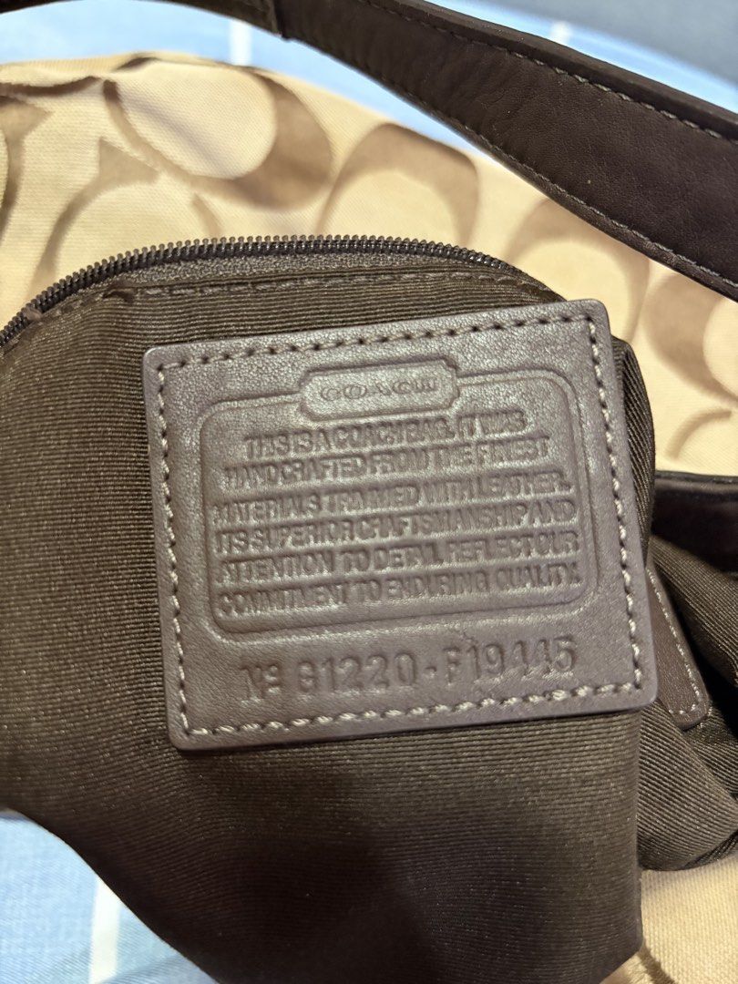 Coach Brown Signature Hobo (Category: Luxury Bags & Wallets) located in Dagupan City. Submitted by beltranmon75535 (Listing ID 1464015391, Image 2). Description: Coach Brown Signature Hobo 🤎🤎 No rubs Normal signs of use Needs some cleaning; has some yellow stains Overall, still in good to excellent preloved condition Payment first 💸 Add sf First to pay basis | No reservations 📍Dagupan City.