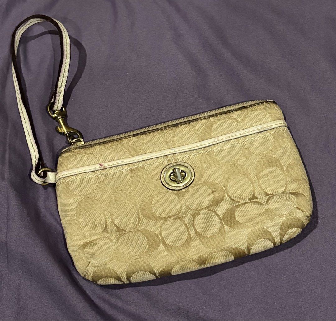 Coach Large Wristlet (Category: Luxury Bags & Wallets) located in Bacolod City. Submitted by yeshua2000 (Listing ID 1464076116, Image 1). Description: Coach Vintage Wristlet Auth Canvass material Good condition Preloved item so expect signs of use Needs cleaning only Stored for a long time ₱850 last price Bacolod City.