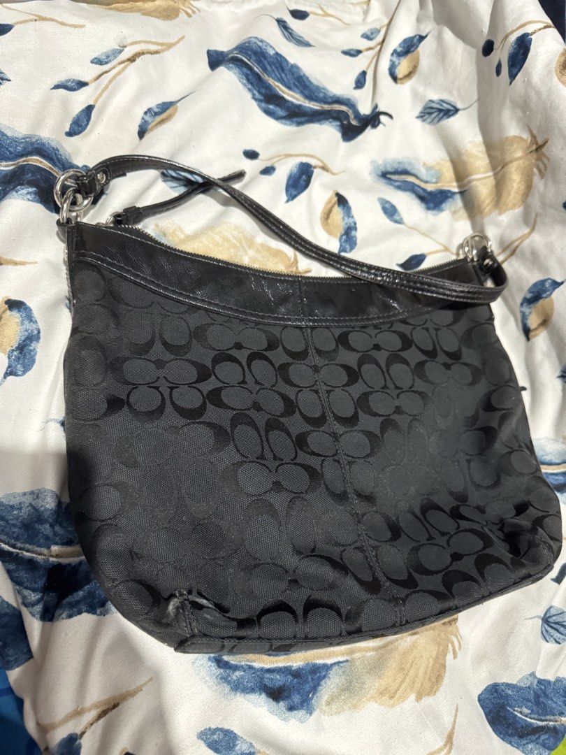Coach Monogram Canvas Leather Trim Shoulder Bag (Category: Luxury Bags & Wallets) located in Valenzuela. Submitted by ellich17 (Listing ID 1464089071, Image 2). Description: Authentic monogram coach Sign of usage no major issue Inside needs cleaning.