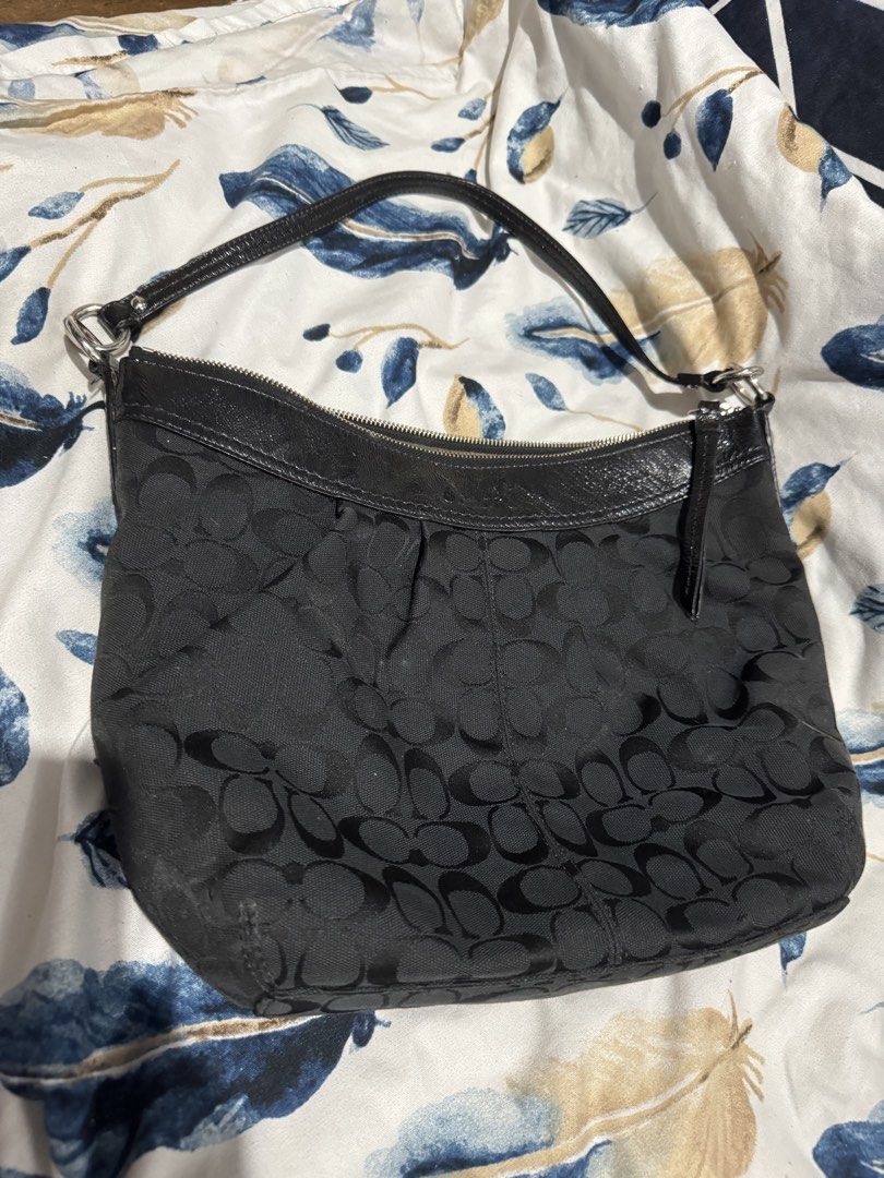 Coach Monogram Canvas Leather Trim Shoulder Bag (Category: Luxury Bags & Wallets) located in Valenzuela. Submitted by ellich17 (Listing ID 1464089071, Image 1). Description: Authentic monogram coach Sign of usage no major issue Inside needs cleaning.
