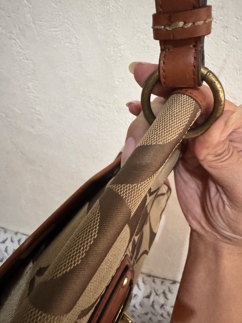 Coach Monogram Canvas Leather Trim Shoulder Bag (Category: Luxury Bags & Wallets) located in Dumaguete. Submitted by luxxe_babe (Listing ID 1464134269, Image 3). Description: SALE SALE SALE Vintage Coach monogram 2-way bag in tan and brown signature canvas with brown leather trim. Gold hardware, clasp closure, and top handle. With removable sling. No Hang tag. 😥 Clean inside and out, perfect for everyday use. Signs of usage. Overall, the bag is 