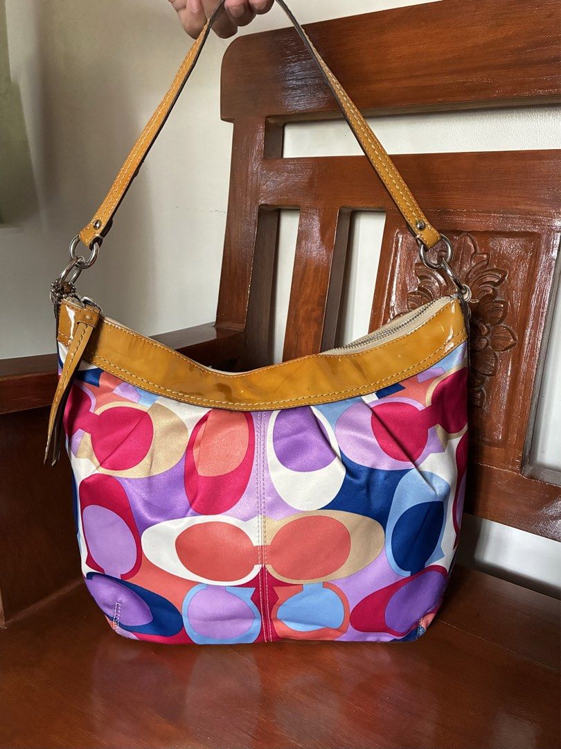 Coach Multicolor Scarf Print Hobo Bag (Category: Shoulder Bags) located in Pili. Submitted by aweyn444 (Listing ID 1463983740, Image 2). Description: - Rare - Authentic - YKK Zipper & Coded - Condition: 9.5/10 ⭐️: with hangtag | smooth pa ang zipper | no rubs or lints ang sateen ⚠️Issue: sign of use & minimal stain sa interior only mop: gcash | gotyme mod: jnt | flash express .