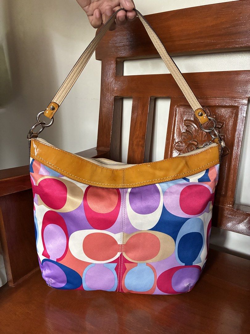 Coach Multicolor Scarf Print Hobo Bag (Category: Shoulder Bags) located in Pili. Submitted by aweyn444 (Listing ID 1463983740, Image 3). Description: - Rare - Authentic - YKK Zipper & Coded - Condition: 9.5/10 ⭐️: with hangtag | smooth pa ang zipper | no rubs or lints ang sateen ⚠️Issue: sign of use & minimal stain sa interior only mop: gcash | gotyme mod: jnt | flash express .