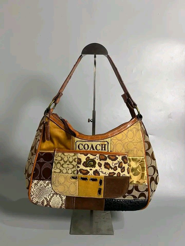 Coach Patchwork Hobo Bag (Category: Luxury Bags & Wallets) located in Mangaldan. Submitted by 4r._ashtrid (Listing ID 1464050919, Image 1). Description: - Unique Coach hobo bag - Eye-catching patchwork design - Classic Coach 'C' logo - Leopard print accents - Snake print accents - Genuine leather trim and strap - Convenient front pocket with turn-lock closure - Perfect statement accessory.