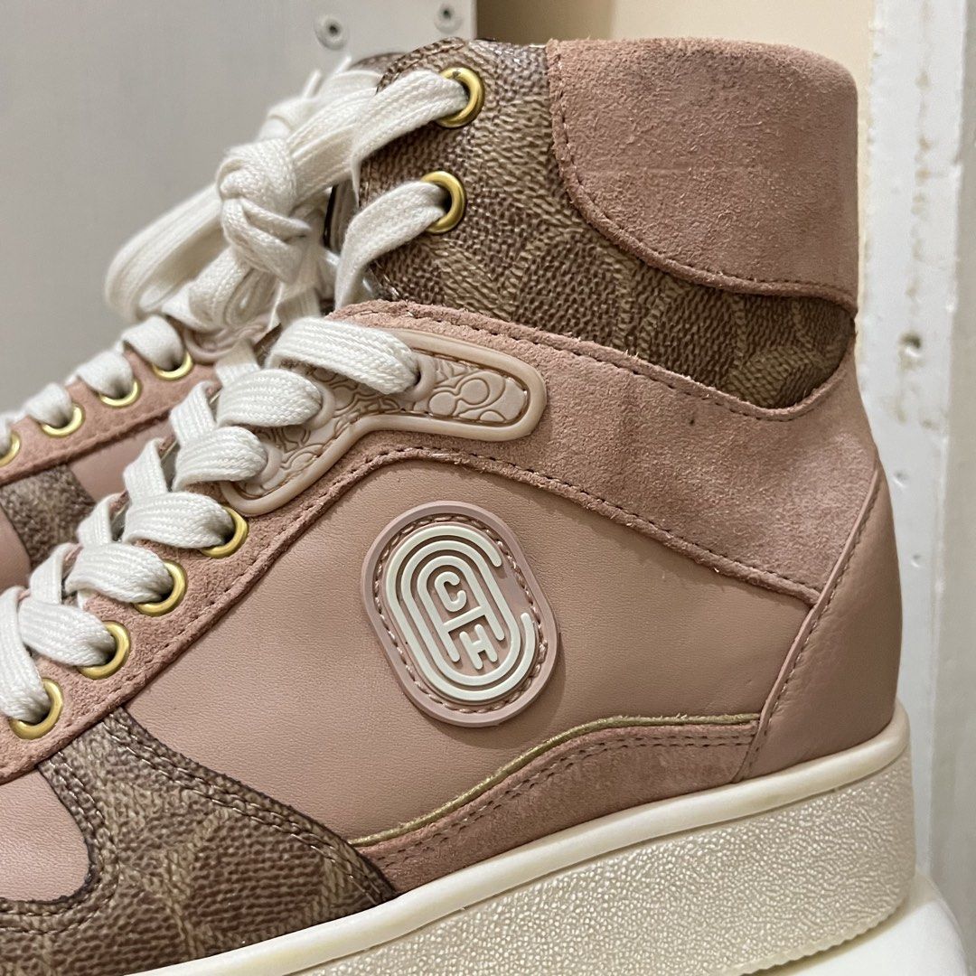 Coach Pink Monogram High-Top Sneakers (Category: Sneakers) located in Quezon City. Submitted by lovedbythea___ (Listing ID 1464034682, Image 3). Description: BUY AT UR OWN RISK ‼️ padala from US, idk if orig orig but looks like it since mabigat siya never used—sinukat sukat lang .