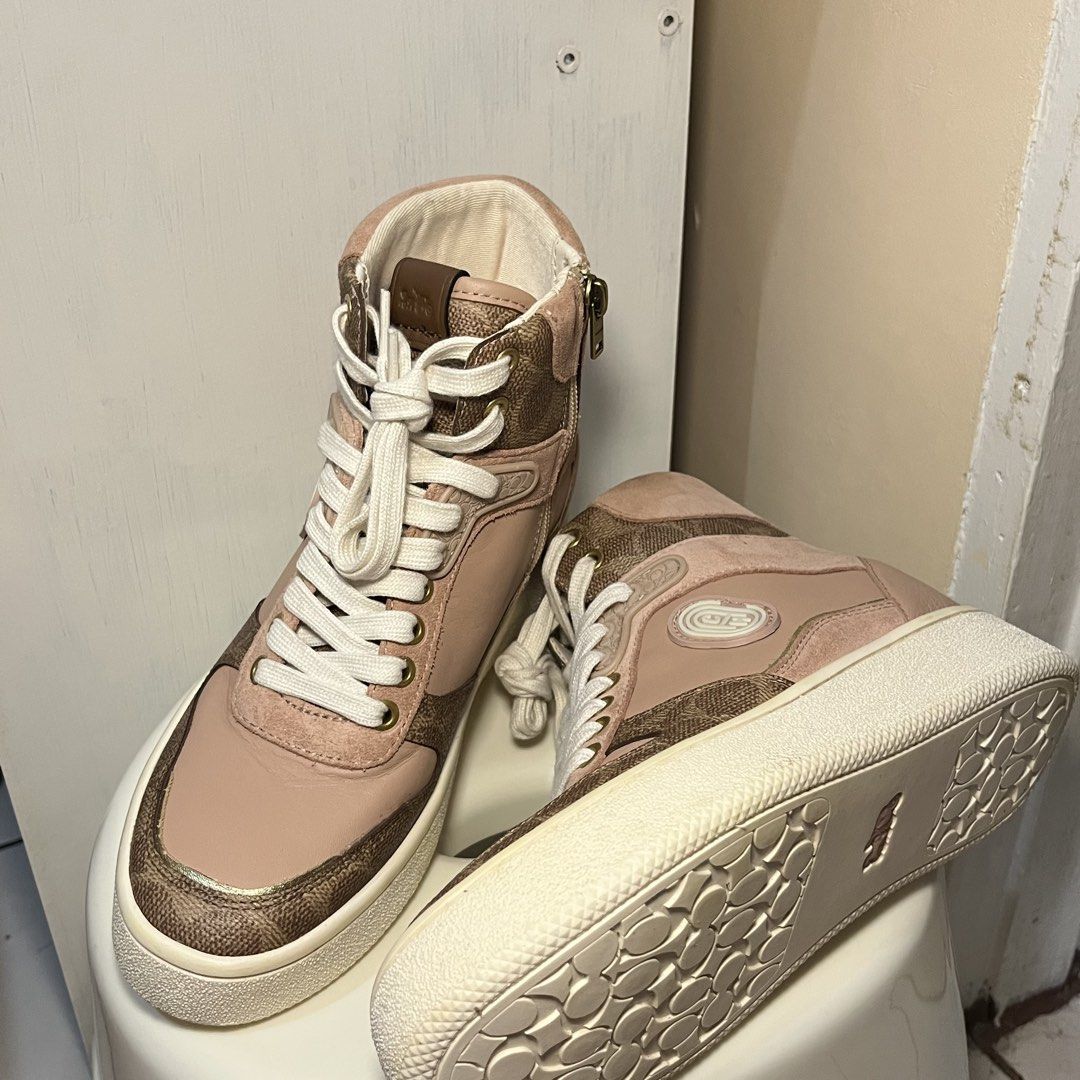 Coach Pink Monogram High-Top Sneakers (Category: Sneakers) located in Quezon City. Submitted by lovedbythea___ (Listing ID 1464034682, Image 2). Description: BUY AT UR OWN RISK ‼️ padala from US, idk if orig orig but looks like it since mabigat siya never used—sinukat sukat lang .