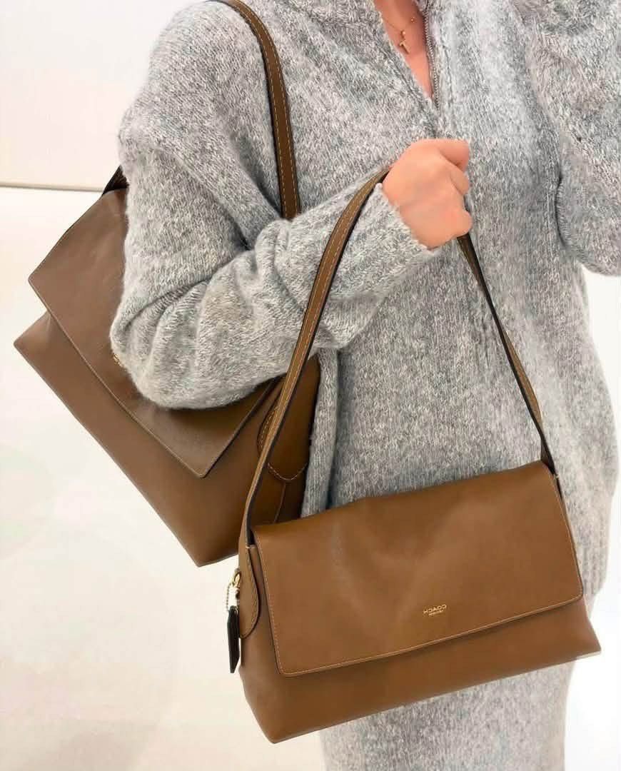 Coach Shoulder Bag - Brown Leather & Suede Options (Category: Shoulder Bags) located in Caloocan City. Submitted by brandeditemsph (Listing ID 1464040362, Image 3). Description: - Authentic Coach shoulder bag - Available colors: Brown Leather, Brown Suede, Bright Pink Suede - Ideal for everyday use - Includes a detachable strap - Please check photos for condition and details.