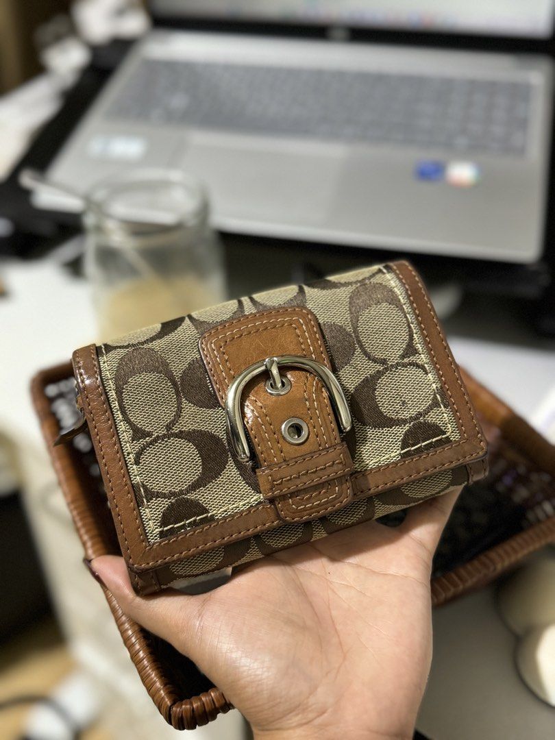 Coach Soho Medium Wallet (Category: Luxury Bags & Wallets) located in Lagawe. Submitted by favorsnflavors69115 (Listing ID 1463946138, Image 2). Description: ✅AVAILABLE Black keyring coin purse/card holder- 1,590 ❌Brown card holder-SOLD SOLD ❌Medium soho 2,450.