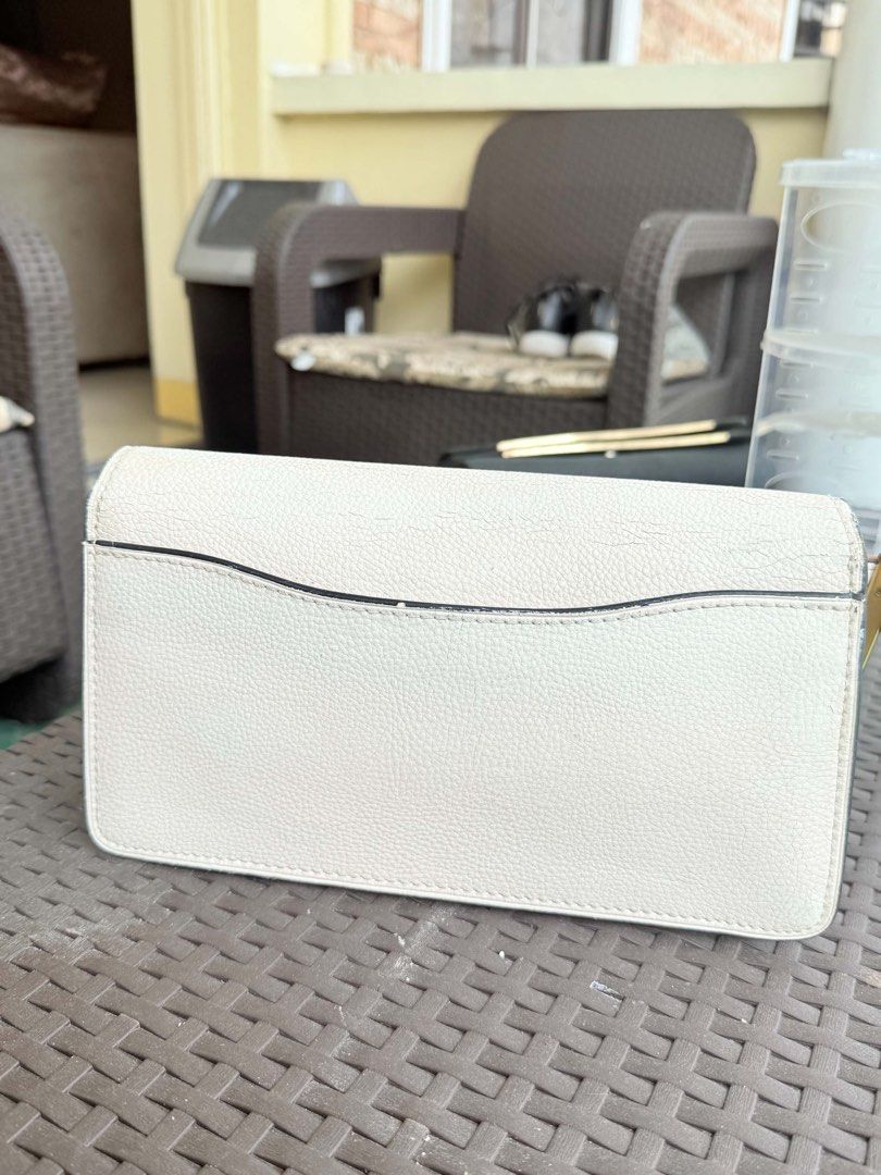 COACH Tabby Crossbody bag (Category: Cross-body Bags) located in Manila. Submitted by jamesyoungdope (Listing ID 1463974025, Image 2). Description: Brand: Coach New York Color: Chalk / Off-White (may signature gold/brass ‘C’ logo buckle) Material: Premium pebbled leather Origin: Made in Vietnam Condition: Excellent / Good condition (see pictures for actual details).