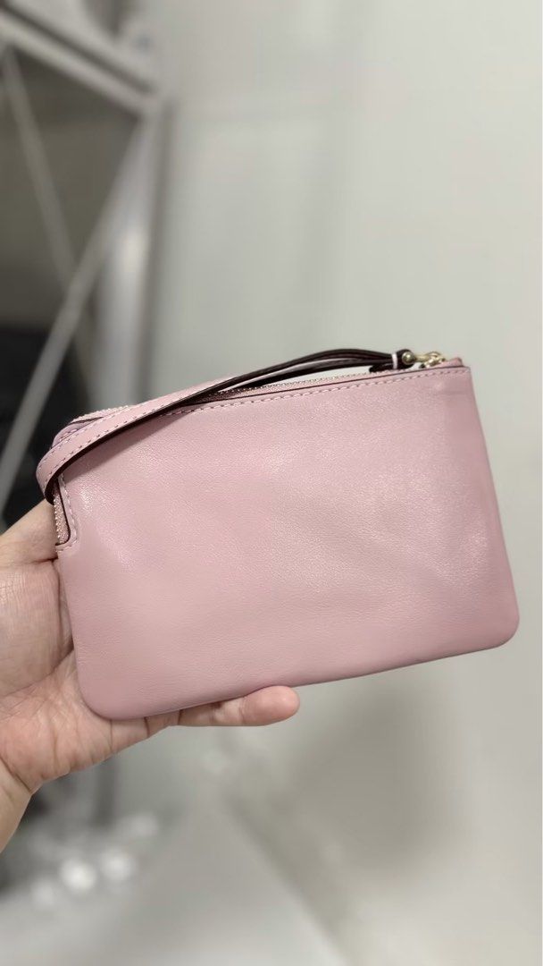 Coach Wrislets (Category: Wallets & Card holders) located in Manila. Submitted by seresaa_authentics (Listing ID 1463997698, Image 2). Description: 🩷 PINK & PERFECT — YOUR NEXT COACH PIECE IS HERE! ✨ That pretty pink Coach wristlet you’ll want to take everywhere! 🎀 ✨ 100% Authentic Coach 👜 Chic + practical 💗 Perfect for everyday & occasions 📦 Ready to ship Don’t wait too long — limited stock only! 📩 Message us now to reserve yours. FB: Sere