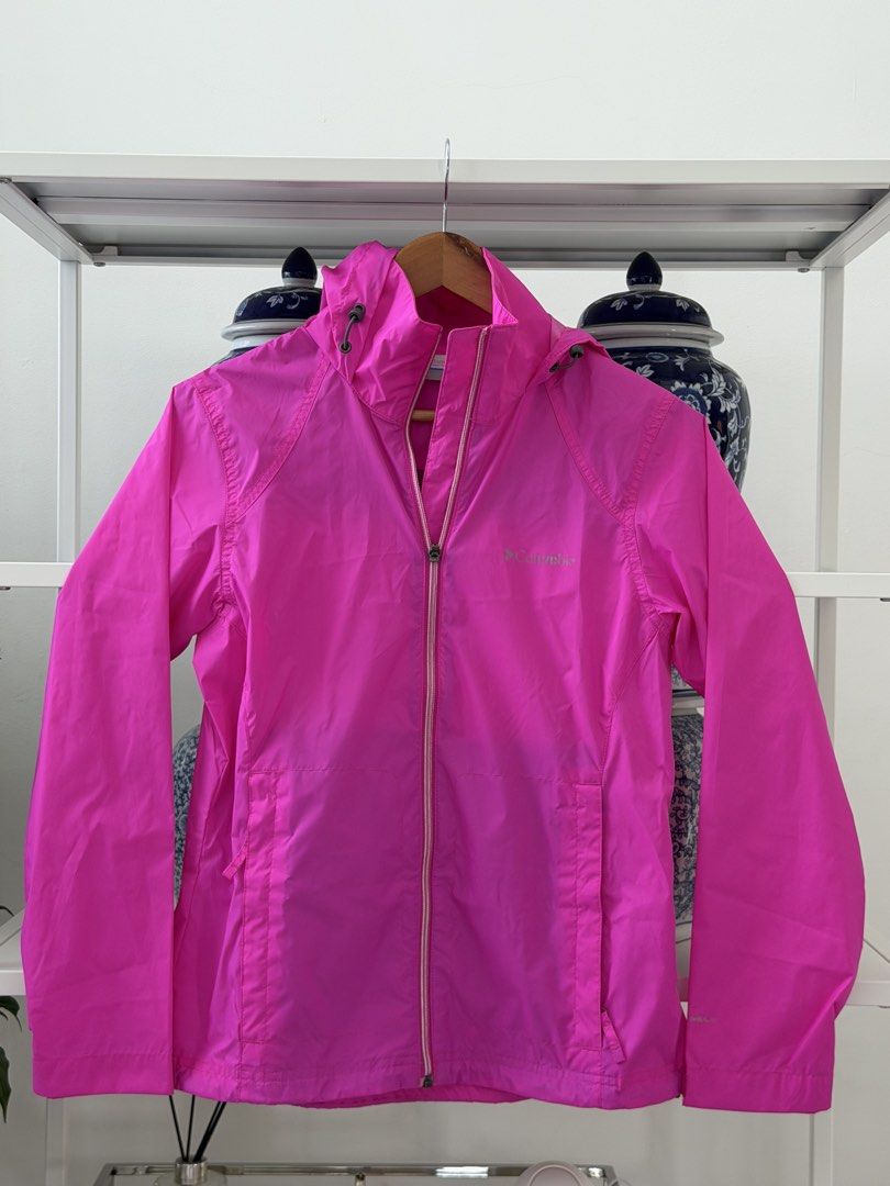 Columbia Pink Hooded Lightweight Rain Jacket (Category: Coats, Jackets and Outerwear) located in Lipa City. Submitted by pauline0303 (Listing ID 1464134054, Image 1). Description: - Bright pink Columbia jacket - Size S - Features a hood and full zip front - Lightweight material, ideal for rainy days or as a windbreaker - Two front pockets - Made in Vietnam - Perfect for outdoor activities.