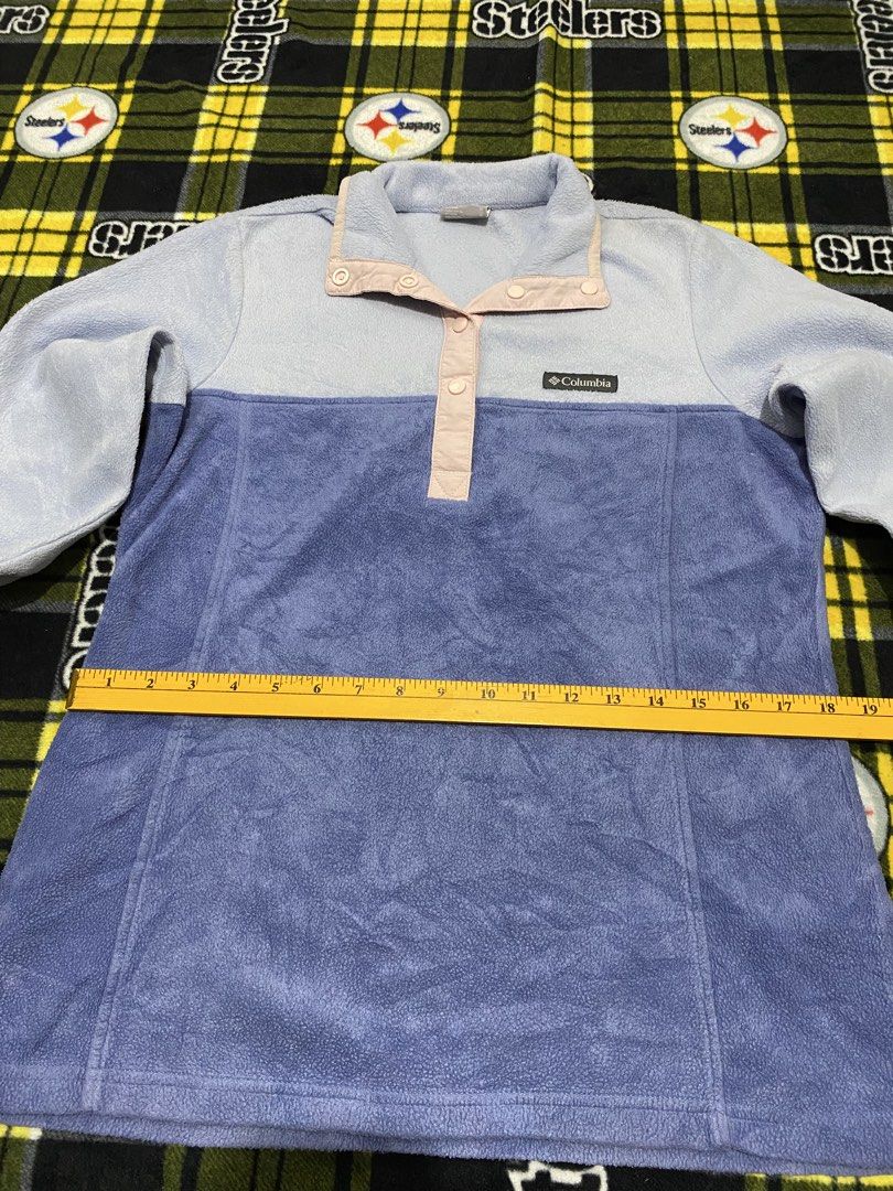 COLUMBIA,Fleece sweatshirt (Category: Coats, Jackets and Outerwear) located in Cavite. Submitted by jc_thrift95 (Listing ID 1464049881, Image 3). Description: - a cozy Columbia colorblock fleece pullover featuring a light blue upper body and a darker purple lower half, accented with a contrasting pink snap-button placket. - Made in Vietnam - Color rate 8/10 - See pictures details for dimes..