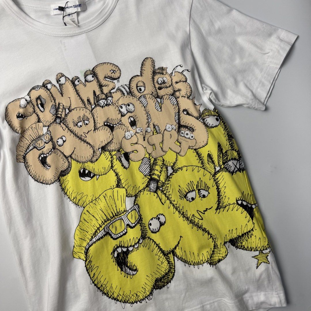 Comme des garcons x kaws (Category: Tshirts & Polo Shirts ) located in Quezon City. Submitted by beastmnl (Listing ID 1464055382, Image 3). Description: Dimension 20 width 28 length .