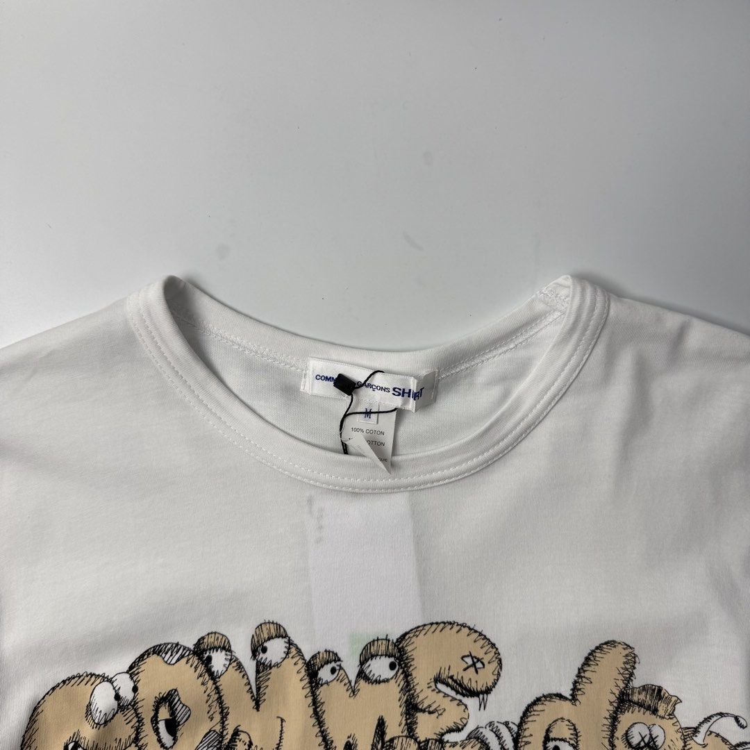 Comme des garcons x kaws (Category: Tshirts & Polo Shirts ) located in Quezon City. Submitted by beastmnl (Listing ID 1464055382, Image 2). Description: Dimension 20 width 28 length .