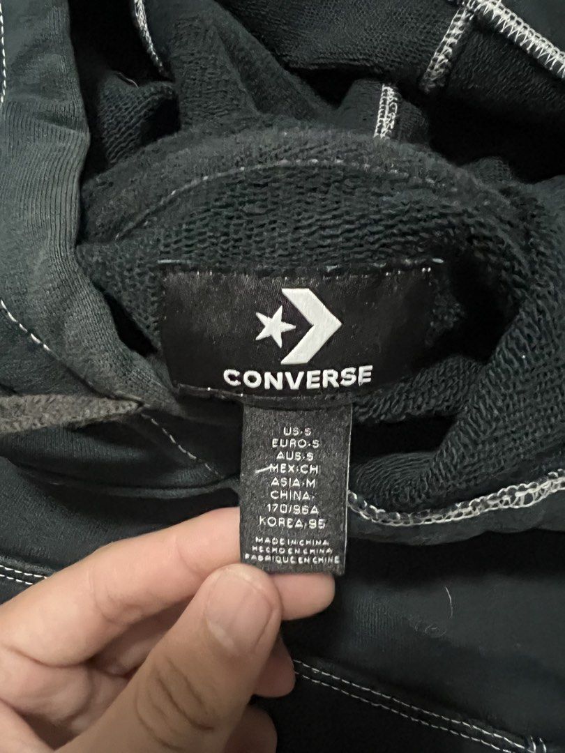 Converse Black Hoodie with Sneaker Logo (Category: Hoodies) located in Manila. Submitted by justin_sy (Listing ID 1463983473, Image 3). Description: - Black Converse hoodie - Small embroidered high-top sneaker logo on chest - Contrast white stitching throughout - Kangaroo pocket - Size: US S / EUR S - Made in China.