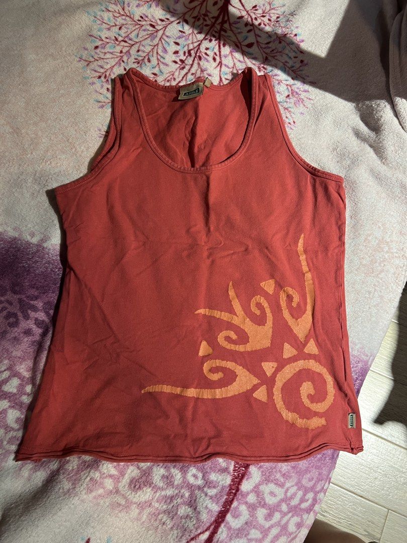 Coral Tank Top (Category: Sleeveless) located in Manila. Submitted by nissi.b (Listing ID 1463990133, Image 1). Description: - still in very good condition - good for xs to s body type - dm for ww pics - loc: sta. mesa, manila.