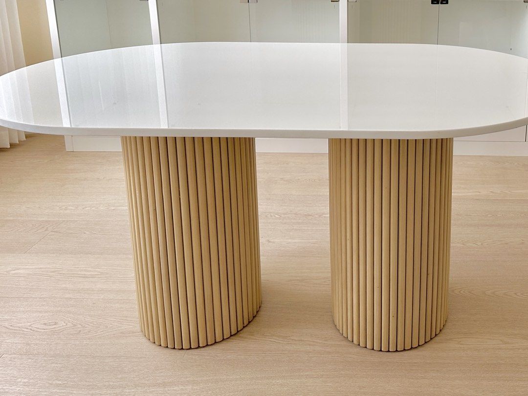 Custom 5ft Table German White Quartz on White Washed Mahogany (Category: Tables & Sets) located in Manila. Submitted by cinnamintcherry (Listing ID 1463952937, Image 3). Description: Brand new, unused in storaged, Custom oval table, 5ft W x 36"in L Legs are fluted white washed mahogany. Table top is German White Quartz. Can be dismantled for easier delivery. RSF: Ordered the wrong size Price open to negotiation. Pick up shouldered by buyer..