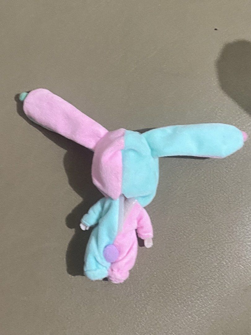 Cute Bunny Ear Doll Pink Blue (Category: Plushies & Soft Toys) located in Davao. Submitted by hoowans_surplus (Listing ID 1464067693, Image 2). Description: - Adorable doll dressed in a pink and blue bunny outfit. - Features a hood with long, floppy bunny ears. - Perfect for doll collectors or as a charming decoration. - Compact size makes it easy to display anywhere. - Outfit is made of soft, plush material..
