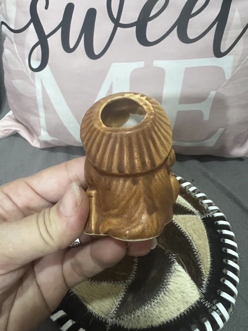Cute Ceramic Tanuki Figurine (Category: Designer & Blind Box Toys) located in Las Pinas. Submitted by maple0305 (Listing ID 1464047798, Image 3). Description: - Adorable ceramic tanuki statue - Features a traditional hat and a prominent big belly - Small opening at the top, ideal for small plants or as a holder - Adds a charming Japanese aesthetic to any home - Makes a unique and thoughtful gift.