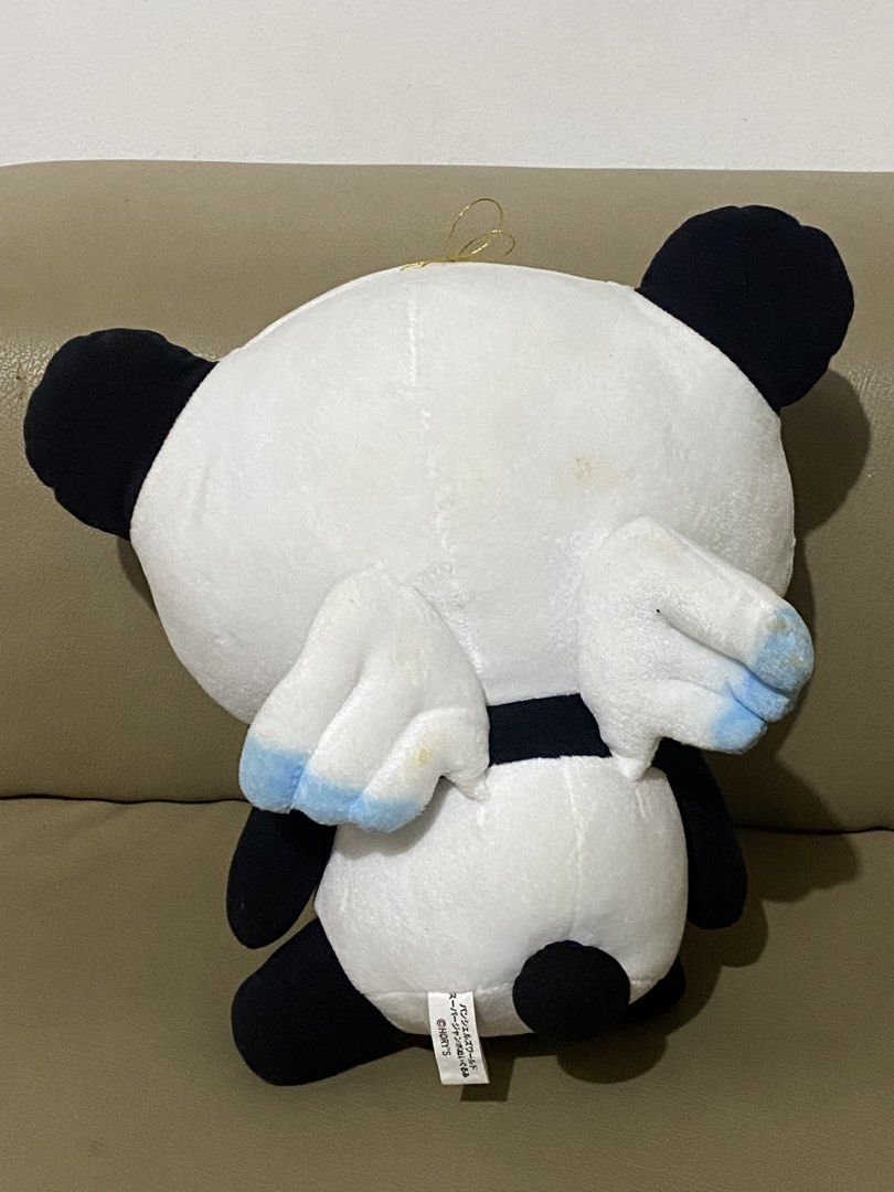 Cute Panda Plush Toy with Wings (Category: Plushies & Soft Toys) located in Davao. Submitted by hoowans_surplus (Listing ID 1463953669, Image 2). Description: - Adorable panda plushie - Features cute little wings with blue accents - Large, expressive round eyes - Perfect size for hugging or decorating - Includes a small tag on the back - Sold as is.