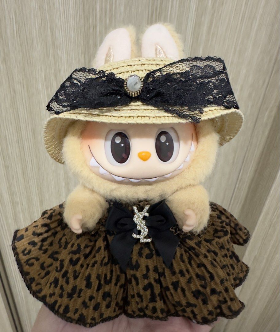 Labubu Baba (Category: Plushies & Soft Toys) located in Alaminos. Submitted by aubreeeeyy (Listing ID 1464103505, Image 1). Description: - Labubu Version 2 (Have a Seat Baba) - No box and card - Guaranteed authentic - Comes with free clothes.