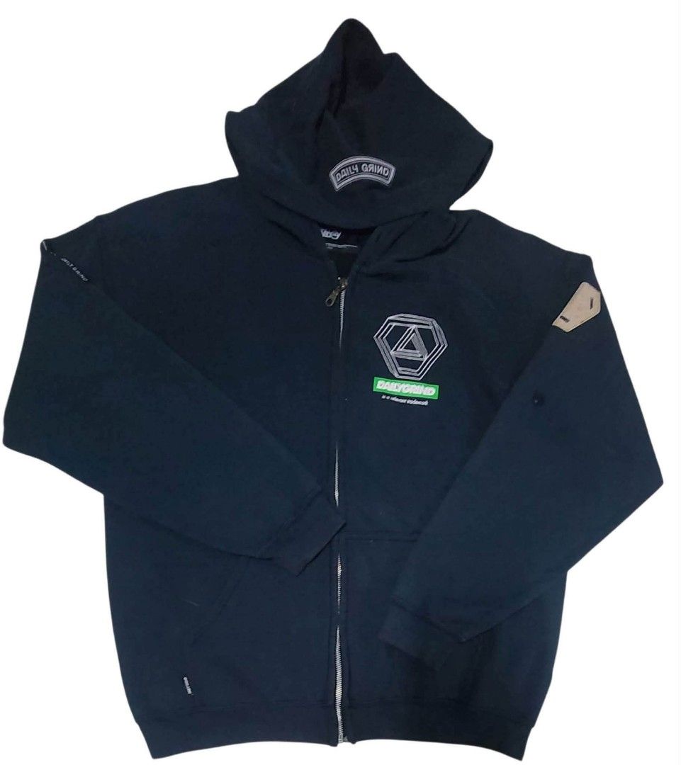 Daily Grind Zip-Up Hoodie (Category: Coats, Jackets and Outerwear) located in Calamba. Submitted by ysabellascloset17 (Listing ID 1463956763, Image 1). Description: - Black zip-up hoodie from Daily Grind - Features signature logo graphic on the front - Includes a patch on the left sleeve - Made from comfortable material - Perfect for everyday casual wear.