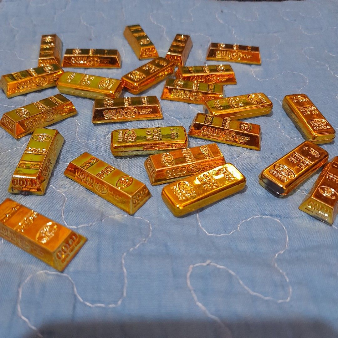 Decorative Gold Bars - Novelty Items (Category: Vintage Collectibles) located in Bocaue. Submitted by marajapansurplus (Listing ID 1463972469, Image 1). Description: - Decorative gold bars, perfect for novelty or display. - Ideal for pranks, party decorations, or as fun props. - Features a nice shine - light weight .