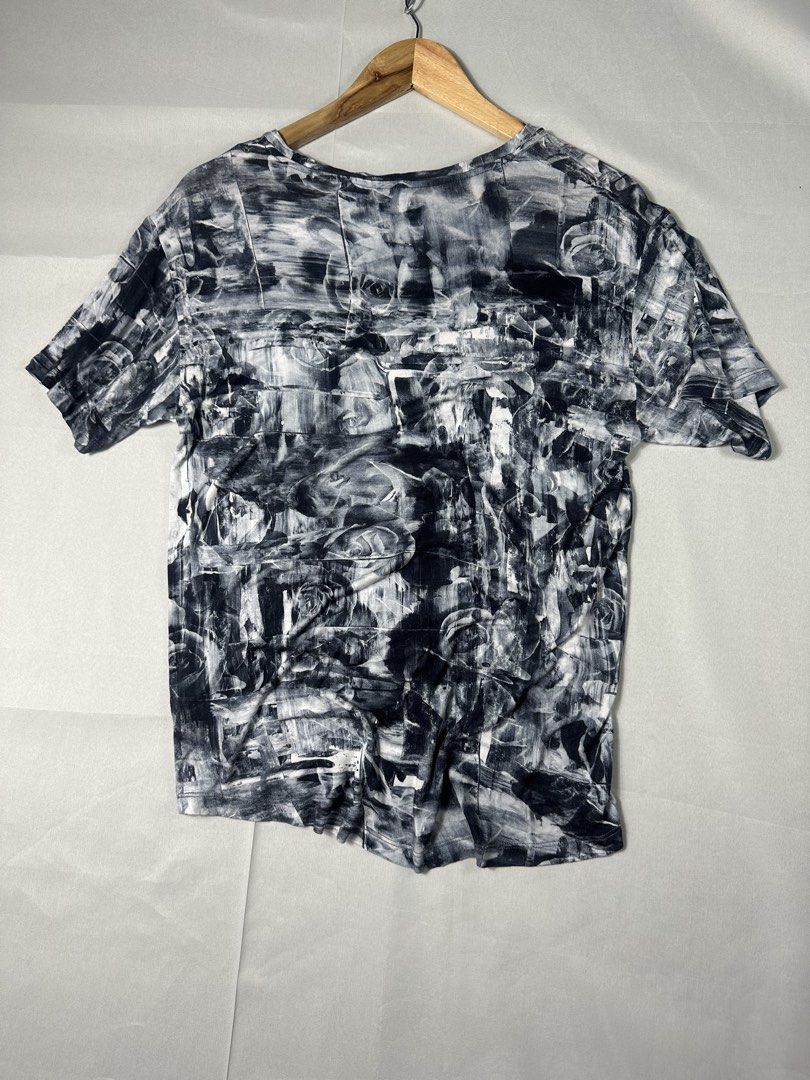 Diesel Abstract Print Tee (Category: Luxury Apparel) located in Cabanglasan. Submitted by thefashiongarage.co (Listing ID 1463947575, Image 2). Description: Title - Diesel Model/Name - Size on Tag - XS can fit to Small Conditiion - Excellent Condition with 1 hole in the upper shoulder - Barely visible due to its design Dimension (WxLxH) - 18x25 Inches Category- Y2K Fitting - Slim / Body Fit Made in - Bulgaria Material - 100% Viscose Color - Multi