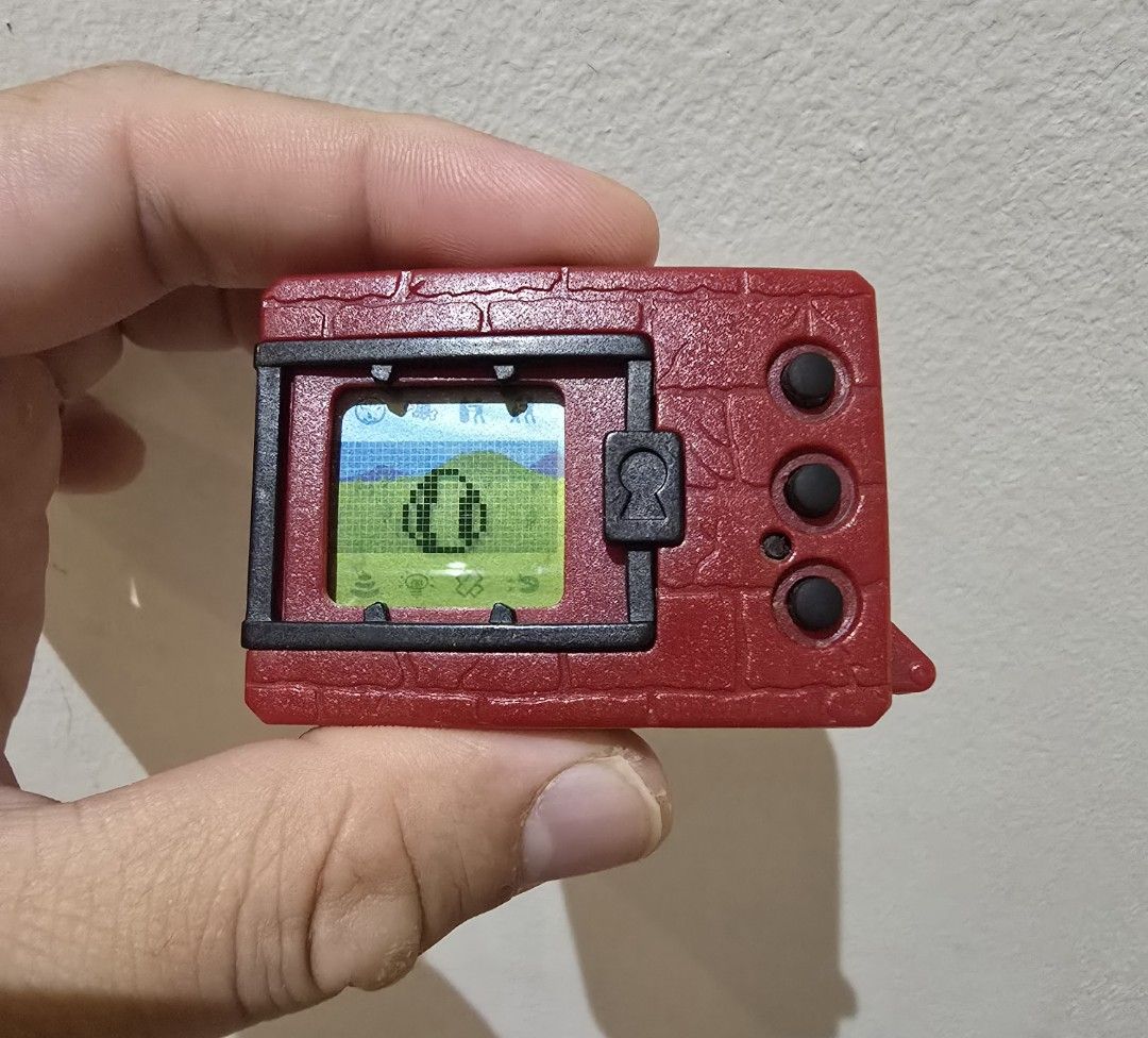 Digimon Vpet Version 1 US Solid Red Rare (Category: Vintage Collectibles) located in Kuala Lumpur. Submitted by danibustard (Listing ID 1464080310, Image 3). Description: perfect NIB condition but without box.