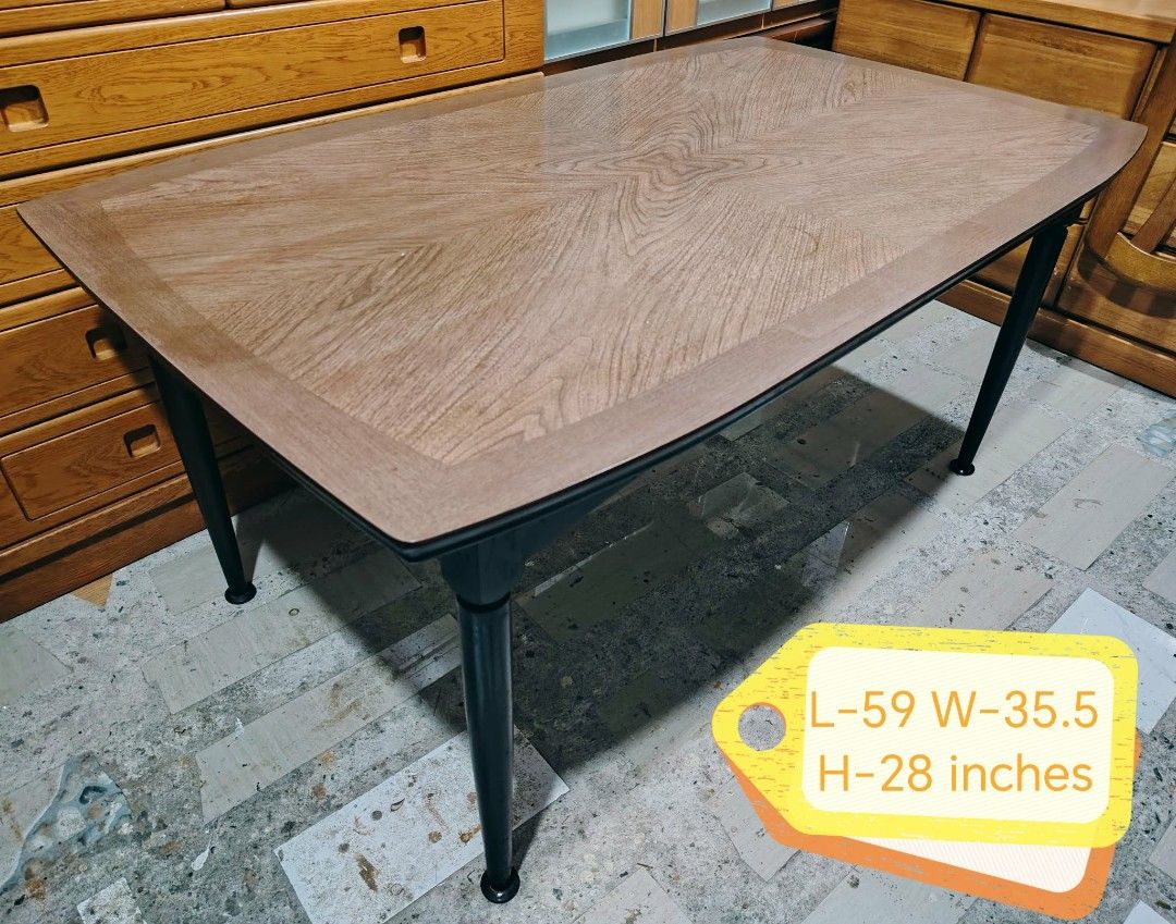 Dining Table (Category: Tables & Sets) located in Taguig. Submitted by sydney08.owl (Listing ID 1463984487, Image 1). Description: Available: Dining Table good for 6 seater Description Details: - Size: L-59" x W-35.5" x H-28 inches - Top: Wood veneer with unique herringbone/chevron wood grain pattern very elegant and vintage Japan style - Legs: Black painted solid wood, sturdy at modern contrast - Shape: Rectangle with slightly rounded corners - 