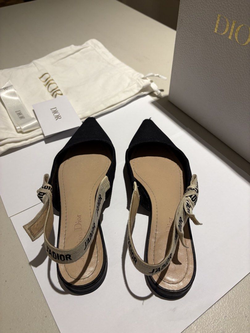 Dior J'Adior Slingback Flats Black Knit (Category: Flats & Sandals) located in Las Pinas. Submitted by camscarabuena (Listing ID 1464080947, Image 3). Description: - Authentic Dior J'Adior slingback flats - Color: Black knit - Signature J'Adior ribbon detail - Pointed toe design - Comfortable slingback strap - Includes original box, dust bags, and ribbon - Price is negotiable.