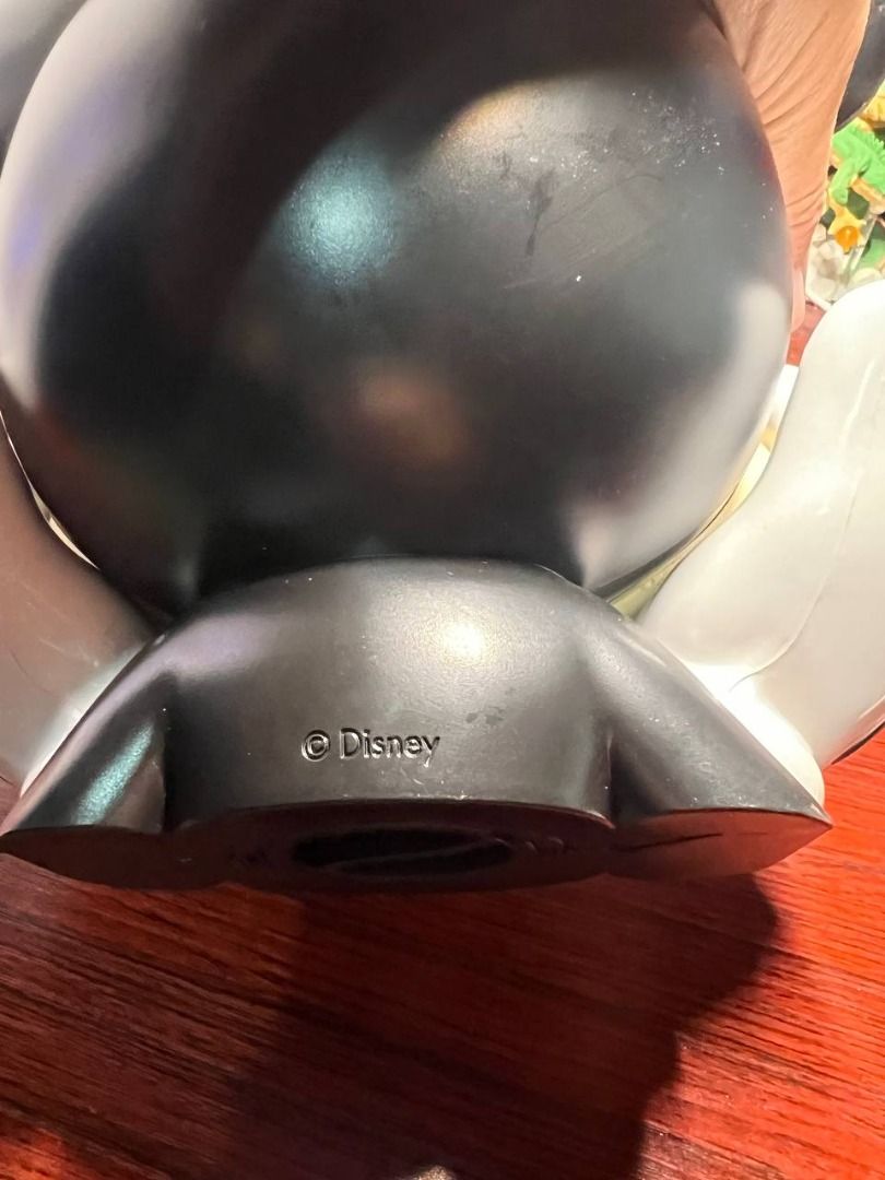 Disney Mickey Mouse Coin bank (Category: Character Goods) located in Baguio. Submitted by ditoyzb08176 (Listing ID 1464060957, Image 3). Description: - Adorable Mickey Mouse coin bank by Disney. - Perfect for saving spare change. - Features an 'Open' cap at the bottom for easy access to savings. - Ideal gift for kids or any Disney enthusiast. Location: BAguio City Shipping: J&T/FLASh/LBC .